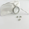 Floating Memories Medaillon, Floating Charms, Floating Medaillon, Hochzeitsmedaillon, Floating Memorys, Handtasche Charms, Charmes, Handtaschen Charms, besonderes Geschenk, Erinnerung, persönliches Schmuckstück, schwebende Kette, schwebendes Medaillon, Hochzeit, Hochzeits-Villa, Hochzeitsgeschenk, Hochzeitsschmuck, Wedding Charms